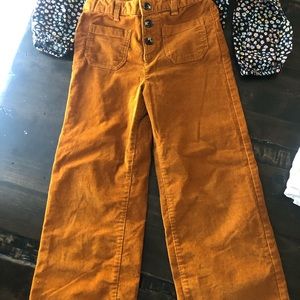 New without tags brown orangey cords. Gorgeous but my daughter hates real pants
